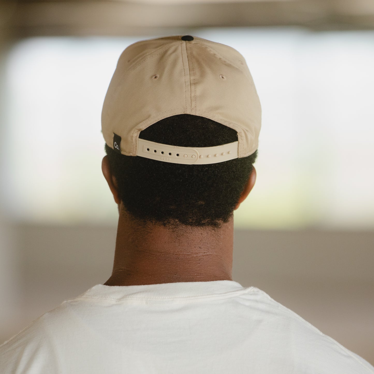 The Unveiling Hat - Black + Tan